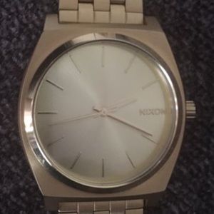 Nixon men’s watch gold color